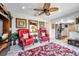 Relaxing living area showcases comfortable seating, decorative artwork, and easy kitchen access at 6524 11Th W Ave # 5611, Bradenton, FL 34209