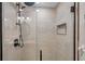 Modern shower with a rainfall showerhead, sleek fixtures, and a built-in shower niche at 6524 11Th W Ave # 5611, Bradenton, FL 34209