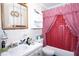 Functional bathroom with a vanity, toilet, and shower at 6812 E 21St Ave, Tampa, FL 33619