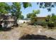 Exterior shot showing sheds and backyard space, ideal for storage and outdoor activities at 6812 E 21St Ave, Tampa, FL 33619