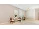 The exercise room has mirrored wall and neutral tones at 7303 Westminster Ct, University Park, FL 34201