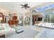 Bright and airy living space with a view of the lanai and pool, ideal for entertaining at 7303 Westminster Ct, University Park, FL 34201