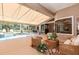 Beautiful pool area featuring an enclosed seating area with a retractable awning at 7303 Westminster Ct, University Park, FL 34201
