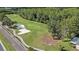 Enjoy stunning golf course views with lush greenery and well-manicured landscaping at 7519 Berna Ln, Land O Lakes, FL 34637