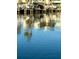 Water shot of boat docks showing boats, docks and their reflections in the water at 7700 Sun Island S Dr # 506, South Pasadena, FL 33707