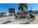 Community area offers grills, tiki huts, and views of boats in the marina, enhancing outdoor living at 7700 Sun Island S Dr # 506, South Pasadena, FL 33707
