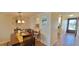 Open concept dining area adjacent to the kitchen for easy entertaining and serving meals at 7700 Sun Island S Dr # 506, South Pasadena, FL 33707