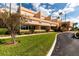An attractive multi-Gathering complex features lush green lawns and mature landscaping at 7700 Sun Island S Dr # 506, South Pasadena, FL 33707