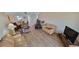 Bright living room featuring wood floors, comfortable seating, and stylish decor at 7700 Sun Island S Dr # 506, South Pasadena, FL 33707