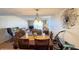 Open concept living space with dining area and cozy furniture, creating an inviting atmosphere at 7700 Sun Island S Dr # 506, South Pasadena, FL 33707