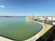 Scenic view of a blue water canal with neighborhood condos in the background at 7700 Sun Island S Dr # 506, South Pasadena, FL 33707