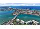 Waterfront aerial view of the condominium buildings featuring nearby beaches, waterways, and city at 7872 Sailboat Key S Blvd # 602, South Pasadena, FL 33707