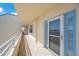 Covered balcony features tile flooring with views of the community and natural light at 7872 Sailboat Key S Blvd # 602, South Pasadena, FL 33707