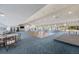 Expansive ballroom featuring a dance floor, stage, and ample seating, perfect for hosting large gatherings at 7872 Sailboat Key S Blvd # 602, South Pasadena, FL 33707