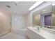 Modern bathroom with walk-in shower, soaking tub, and sleek vanity at 7872 Sailboat Key S Blvd # 602, South Pasadena, FL 33707