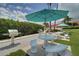 Enjoy outdoor cooking with community gas grills and picnic seating shaded with an umbrella at 7872 Sailboat Key S Blvd # 602, South Pasadena, FL 33707