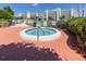 Relaxing hot tub area surrounded by lush landscaping and walking distance to resort amenities at 7872 Sailboat Key S Blvd # 602, South Pasadena, FL 33707
