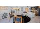 Comfortable living room featuring furniture and a partial view of an open kitchen area at 7872 Sailboat Key S Blvd # 602, South Pasadena, FL 33707