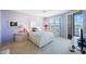 Cozy main bedroom with scenic water views, calming paint, and stylish furnishings at 7872 Sailboat Key S Blvd # 602, South Pasadena, FL 33707