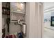 Utility closet with HVAC system, shelving, and additional storage, conveniently located near the kitchen area at 7872 Sailboat Key S Blvd # 602, South Pasadena, FL 33707