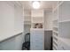 Spacious walk-in closet featuring built-in shelving and ample storage space at 7872 Sailboat Key S Blvd # 602, South Pasadena, FL 33707