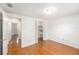 Bedroom featuring a closet and hardwood floors, and neutral color palette at 8212 Malvern Cir, Tampa, FL 33634