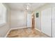 Neutral spare bedroom with ceiling fan, closet, and natural lighting at 8706 Driftwood Dr, Tampa, FL 33615