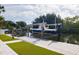 Modern boat dock with lift, showcasing waterfront living at its finest at 8706 Driftwood Dr, Tampa, FL 33615