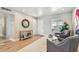 Welcoming entryway with wood floors, leading to the home's living spaces at 8706 Driftwood Dr, Tampa, FL 33615