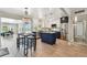 Open-concept kitchen with modern appliances, an island, and ample counter space at 8706 Driftwood Dr, Tampa, FL 33615