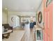Inviting living space featuring light-colored hardwood floors and an open layout at 8706 Driftwood Dr, Tampa, FL 33615