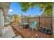 Charming backyard with outdoor seating around a fire pit, perfect for entertaining and relaxation at 9086 Enchantment Dr, Largo, FL 33773
