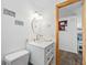 Updated bathroom features a modern vanity and neutral paint at 9086 Enchantment Dr, Largo, FL 33773