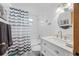 Updated bathroom with shower/tub combo and modern vanity at 9086 Enchantment Dr, Largo, FL 33773