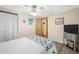 Relaxing bedroom with ample natural light and stylish decor at 9086 Enchantment Dr, Largo, FL 33773