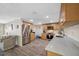Modern kitchen with stainless steel appliances, wood cabinets, and lovely countertop at 9086 Enchantment Dr, Largo, FL 33773