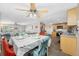Open floorplan with kitchen, dining area, and living room for seamless entertaining at 9086 Enchantment Dr, Largo, FL 33773