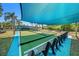 Enjoy the bocce ball court under the canopy, with ample seating at 7519 Berna Ln, Land O Lakes, FL 34637