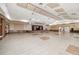 Expansive event space with a stage, neutral decor, and ample room for gatherings and performances at 7519 Berna Ln, Land O Lakes, FL 34637