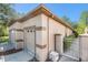 Exterior view of the home with a gated entrance, showcasing the well-maintained landscaping at 7519 Berna Ln, Land O Lakes, FL 34637
