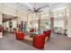 Elegant lobby area with comfortable seating, decorative accents, and ample natural light at 7519 Berna Ln, Land O Lakes, FL 34637