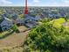 Aerial view of the back of the home featuring a screened in pool and fenced in back yard at 10005 Sage Creek Dr, Ruskin, FL 33573