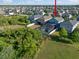 Aerial view of the back of the home featuring a screened in pool and fenced in back yard at 10005 Sage Creek Dr, Ruskin, FL 33573