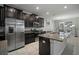 Spacious kitchen with stainless steel appliances, granite countertops, and a central island at 10005 Sage Creek Dr, Ruskin, FL 33573