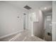 Upstairs landing offers access to a laundry room, other rooms and the staircase to the first floor at 10005 Sage Creek Dr, Ruskin, FL 33573