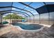 Beautiful screened-in pool with ample deck space at 10005 Sage Creek Dr, Ruskin, FL 33573