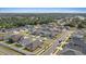 Aerial view of homes in residential neighborhood with lush greenery at 1043 Davis Heather Cir, Seffner, FL 33584