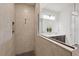 Modern bathroom featuring an open shower and double vanity with vessel sinks at 1043 Davis Heather Cir, Seffner, FL 33584