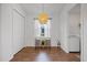 Bright dining area with pendant lighting, flows into laundry room for convenience at 1043 Davis Heather Cir, Seffner, FL 33584
