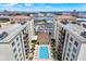 Overhead aerial shot of the apartment complex with a view of the pool and waterfront at 1238 E Kennedy Blvd # 702, Tampa, FL 33602